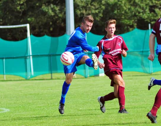 Action from Little Common's 5-0 victory at home to Storrington yesterday. Picture by Steve Hunnisett (SUS-140913-171539002)