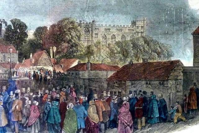 Local people watch display of fireworks from Bridge Street, later renamed Queen Street. Image courtesy of Eric Nash