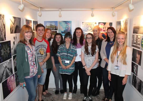 Collyer's photography students at the exhibition SUS-140917-132324001