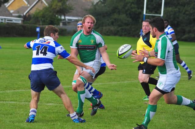 Hastings & Bexhill on the defensive during their 50-17 defeat at home to Horsham last weekend. Picture by Steve Hunnisett (SUS-140913-171433002)