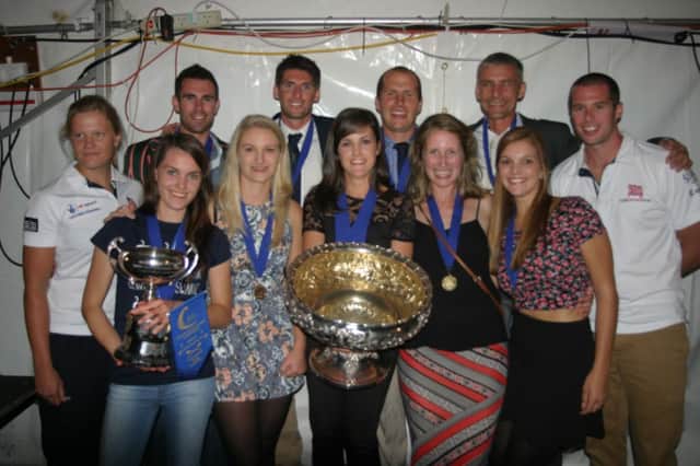 Bexhill Rowing Club men's and ladies' senior four champions show off their trophies at the South Coast Championships in Swanage