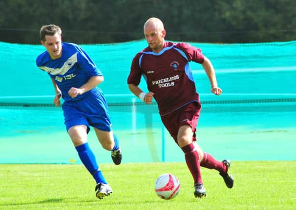 Russell Eldridge on the ball for Little Common during their 5-0 victory at home to Storrington on Saturday. Picture by Steve Hunnisett (SUS-140913-171501002)