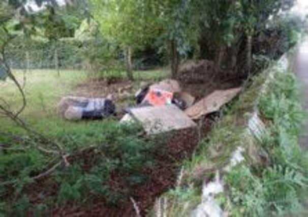 Fly-tipping at Winchelsea SUS-140923-112345001