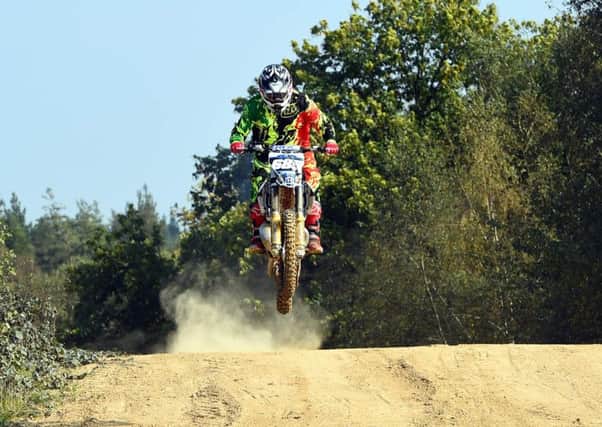 Motorcross riders raise money for Sussex Air Ambulance with a charity event on October 5th. On the track for the Veterans Grand Prix is rider,  John Lawrence. Horsham. Picture : Liz Pearce 220914MC05 SUS-140922-173902008
