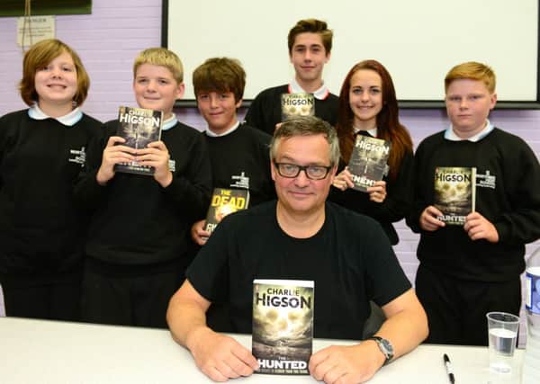 Author Charlie Higson signing books at Worthing High School  WH 170914