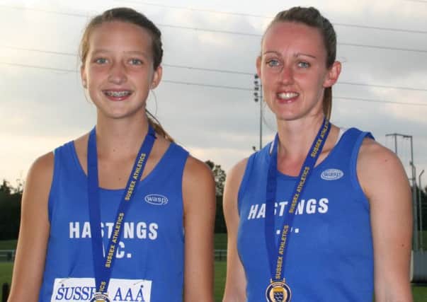 Hastings Athletic Club duo Harmony Cooper and Elise Lovell with their medals from the Sussex Combined Events Championships