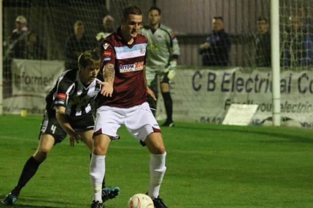 Kenny Pogue on the ball for Hastings United against Tooting & Mitcham United on Monday night. Picture courtesy Joe Knight