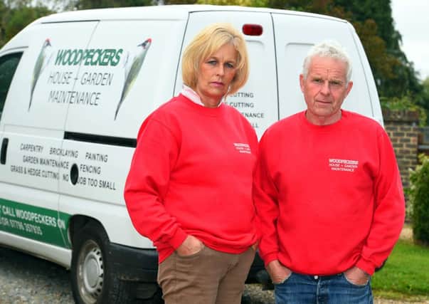 Stolen Trailer. Sarah and John Woodley, who had their trailer stolen, which they have recently acquired for their new business, Woodpeckers House & Garden Maintenance. Picture Liz Pearce. LP240914ST03 SUS-140924-125915008