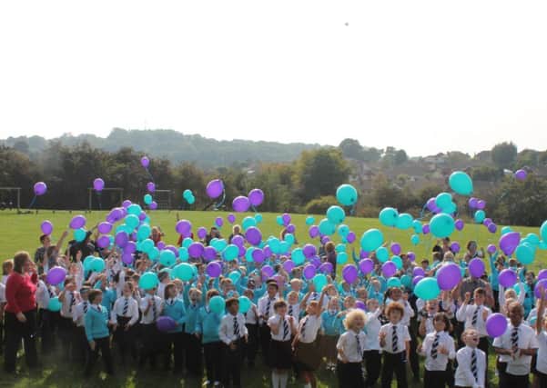 Pupils release the balloons