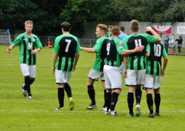 Burgess Hill celebrate their thrid goal. Picture by Emily Hodgkinson