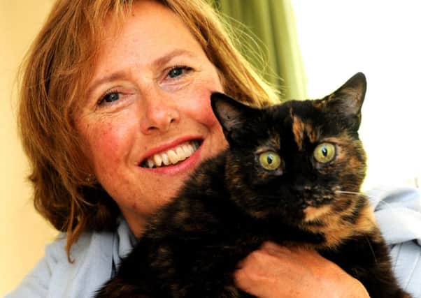Angela Murray and her cat, Esme. Pic Steve Robards