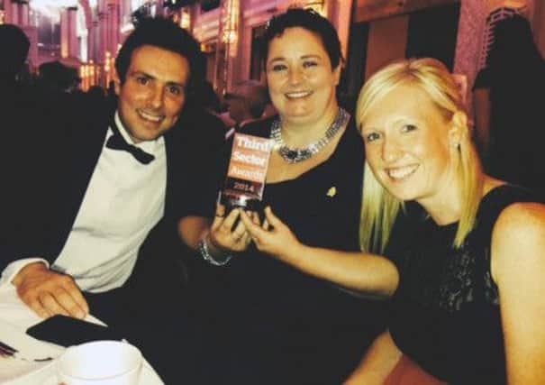 Shooting Star Chase Communications Team with Third Sector Award for Brand Development SUS-140110-122001001