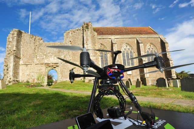 25/9/14- Ariel architectural survey at Winchelsea Church.  The Drone Helicopter- 14th century architecture meets 21st century technology SUS-140925-141215001
