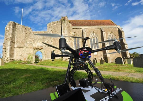 25/9/14- Ariel architectural survey at Winchelsea Church.  The Drone Helicopter- 14th century architecture meets 21st century technology SUS-140925-141215001