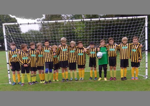 Specsavers in Horsham, located at 57 West Street, has become an official sponsor of Kirdford Cougarâ¬"s under-12 football team and has kitted them out with brand new kits to replace the existing one which is two years old.