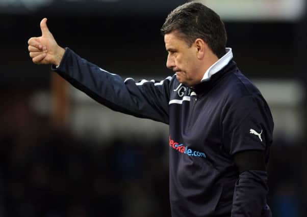 John Gregory shouts instructions during his first game in charge of Crawley Town who drew 0-0 at Bristol Rovers in the FA Cup ENGSUS00220130812222137