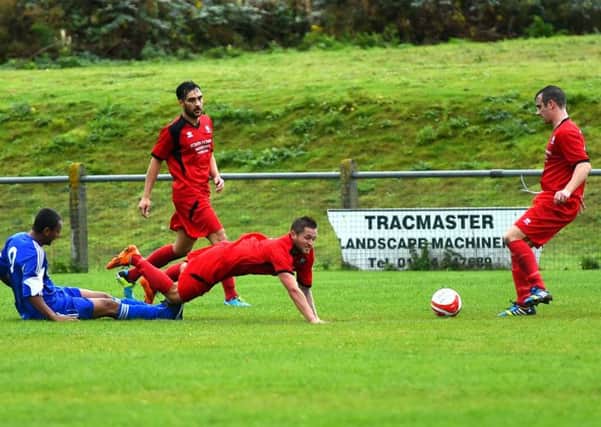 Football. Sussex League. Hassocks v Broadbridge Heath. Action from the match. Picture Liz Pearce. 
LP041014FH13 SUS-140410-201833008