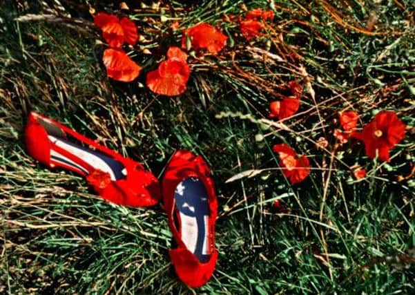 Sylvia Kislingbury's vibrant red shoes and flowers