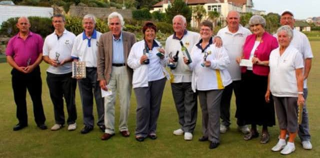The winners and runners-up in the Hastings Open Bowls Tournament's Charity Triples Competition at White Rock Bowling Club