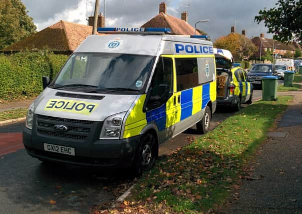 Police vehicles in Spierbridge Road, Storrington, at 12.40pm on Friday October 10.