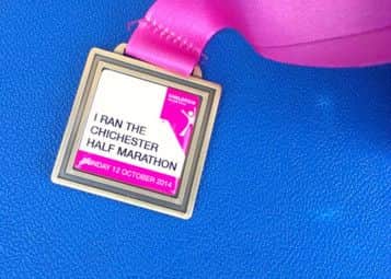 A Chi Half 2014 finisher's medal