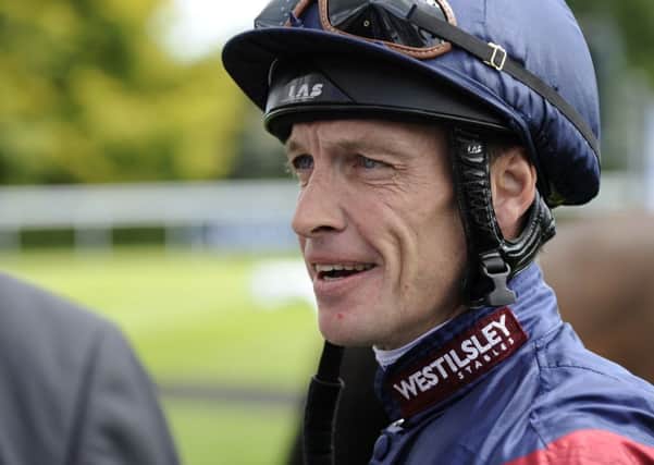 Richard Hughes confirmed his status as Goodwood's top jockey of 2014 with a double  Picture by Malcolm Wells