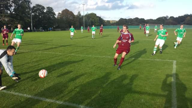 Action from Little Common's 5-2 defeat at home to Rustington yesterday. Picture courtesy Paul Field
