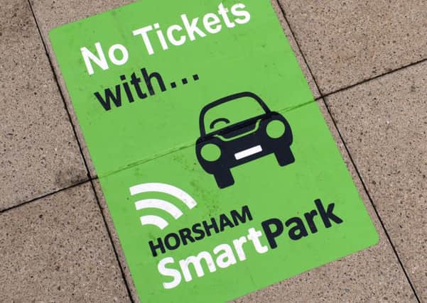 JPCT 290914 S14410095x Horsham . Smart Park stickers in West Street -photo by steve cobb SUS-140929-104903001