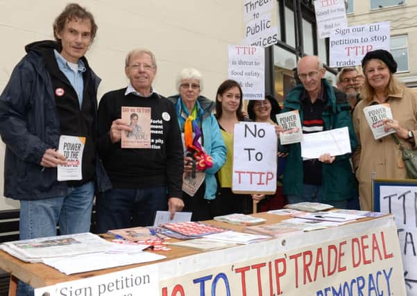 WH 111014 Demonstrators against a new transatlantic trade deal made themselves heard last Saturday