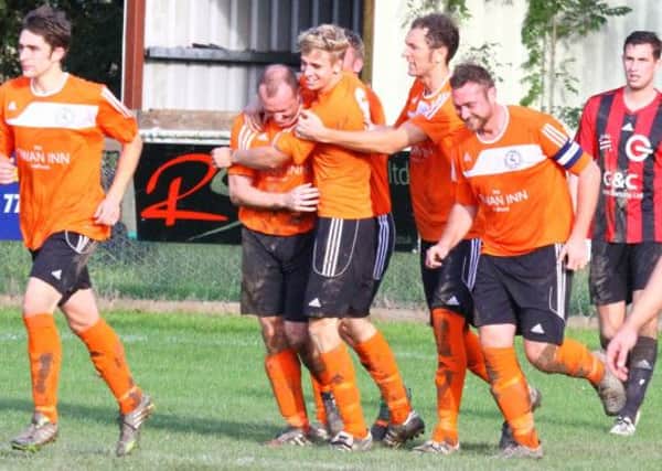 Midhurst celebrate a goal at Uckfield    Picture by Darren Chiverton