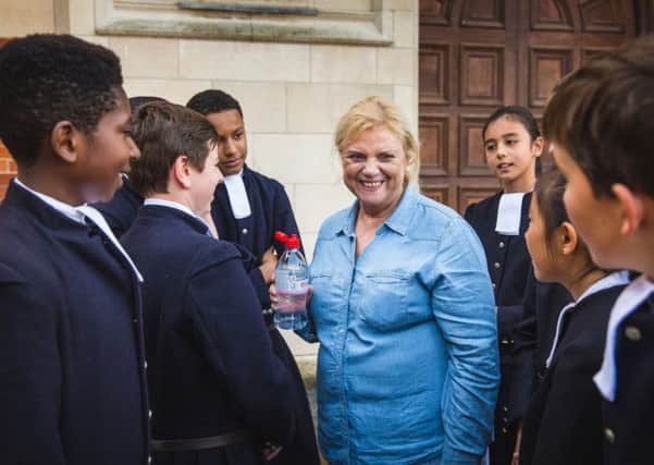 Christina Noble OBE with Christ's Hospital students SUS-141014-111839001