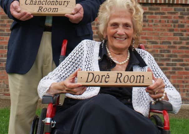 Norah Doré with the new name plaques at Saturdays ceremony