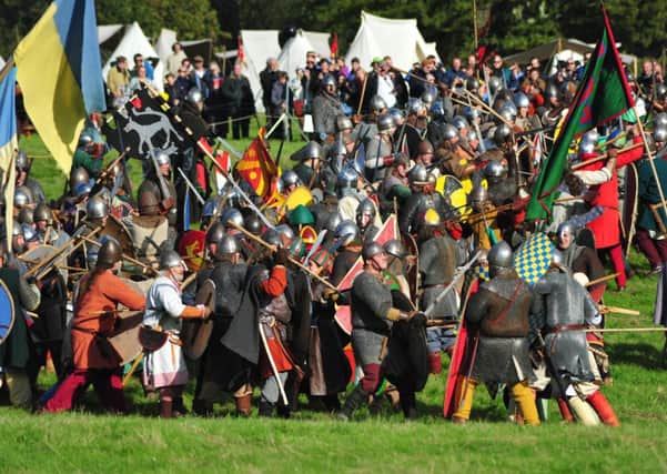 11/10/14- Battle of Hastings re-enactment, Battle. SUS-141110-180740001