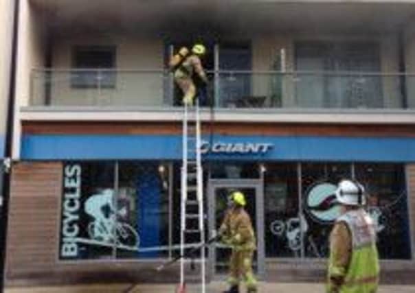 Firefighters in Little High Street this morning PICTURE: GIANT SHOREHAM