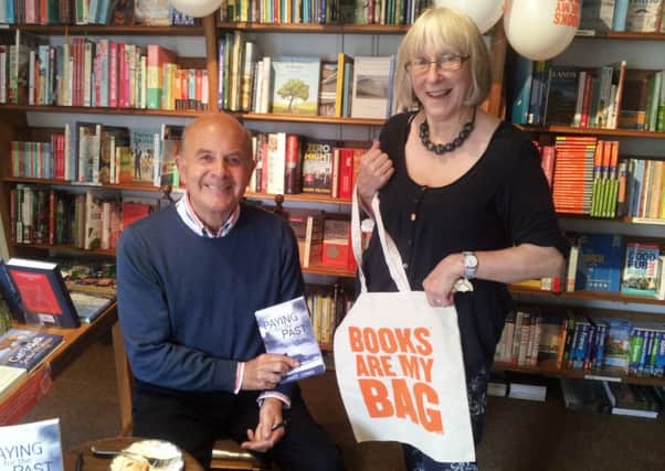 Steyning osteopath Geoff Green, first-time author, at Steyning Bookshop with owner Sara Bowers