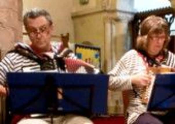Ian and Helen Swyer performing at St Nicolas Church