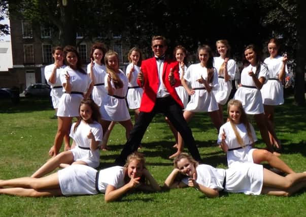 'Gran-Nan Style' creator Gary Mobsby and dancers in Steyne Gardens