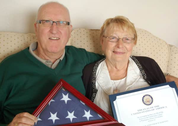 Norman and Grace Barnes of Emmabrooke Court, Rustington, were given an American flag by a member of Congress for the USA to mark their 50th wedding anniversary SUS-141020-154922001