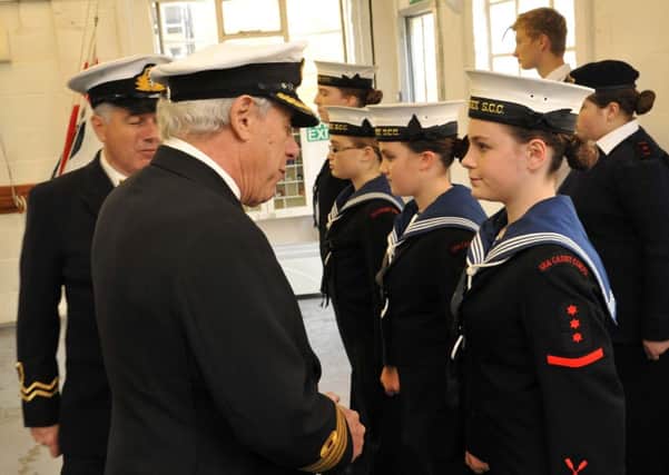 Attention!   Cadets standing proud as Captain John Stoy inspected them during the anniversary L42689H14