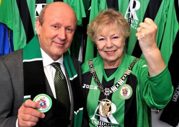 Burgess Hill Mayor Anne Jones with Burgess Hill Town FC's Chairman Kevin Newell at GR team sports wear with the Burgess Hill kit. Pic Steve Robards SUS-141021-114052001