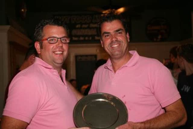 Hastings Seagull captain Duncan Izzard and Dordrecht skipper Arend Haksteen with the Observer Plate