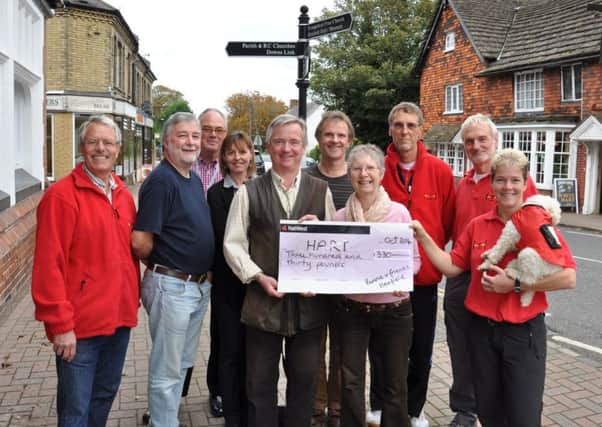 Henfield HART responders receive a  cheque from Bonnie Flitney and musician friends following a concert at Henfield Hall. Picture by Mike Beardall, Oakfield Media SUS-141028-145753001