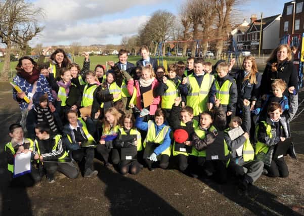 Children from Glebe Primary School and Shoreham Academy support the play area upgrade on Southwick Green