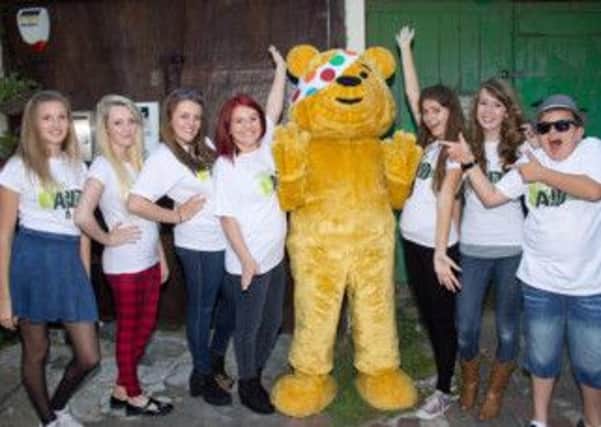 Teen Aid UK singers with Pudsey Bear PICTURE: JAMES CROWTER