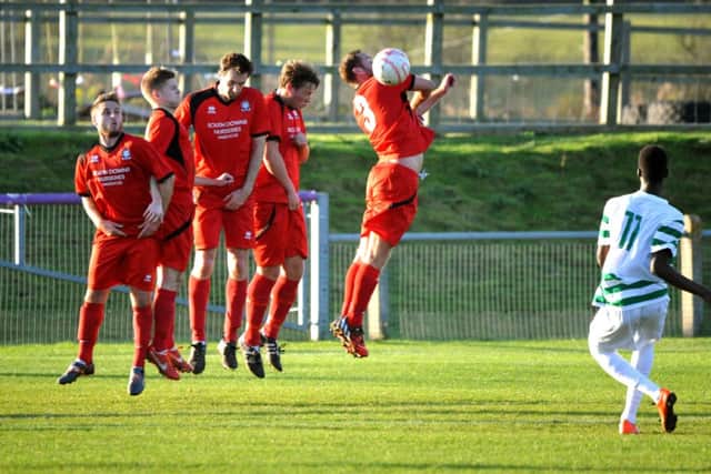 Hassocks (red) v Corinthians. Pic Steve Robards SUS-140111-194254001