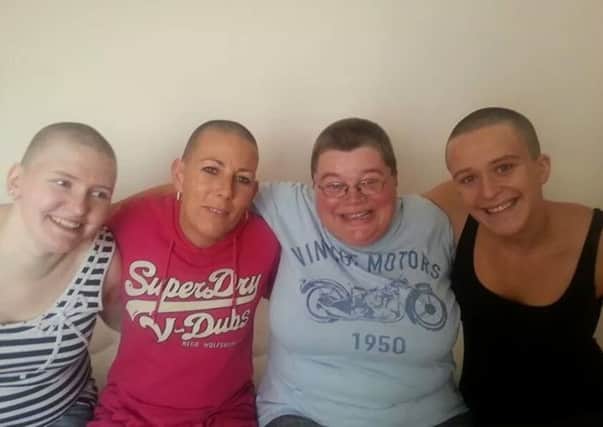 Jessica Cliffton-Hummel, Kirsti Widdows, Sarah Hall and Anne-Marie Simpson all took the chop to raise cash for cancer charity Macmillan. SUS-140311-121312001