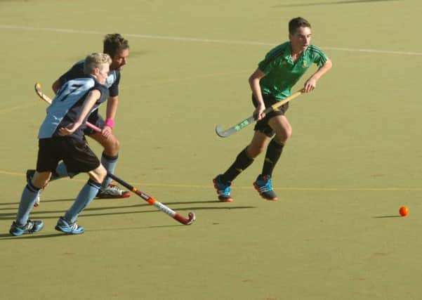 Action from South Saxons Hockey Club's resounding 7-1 win at home to Lewes III. Picture by Simon Newstead (SUS-140311-102044002)