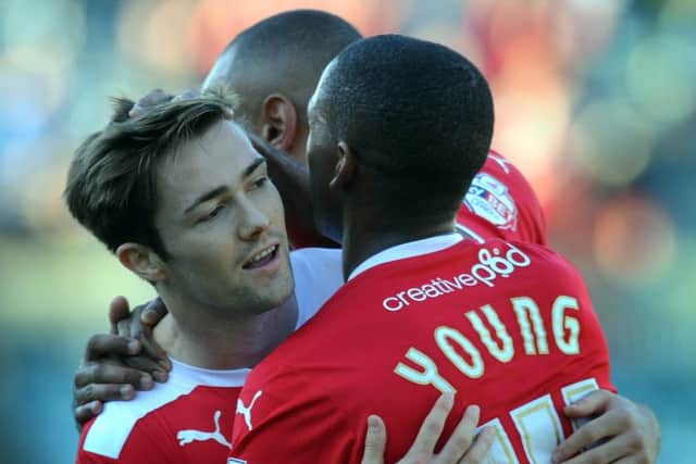 Crawley Town's Gwion Edwards celebrates his goal against Gillingham (Pic by Jon Rigby) SUS-141026-122552002