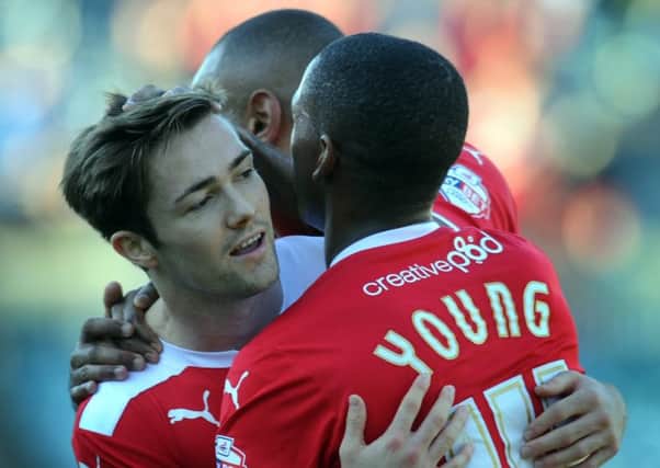 Crawley Town's Gwion Edwards celebrates his goal against Gillingham (Pic by Jon Rigby) SUS-141026-122552002