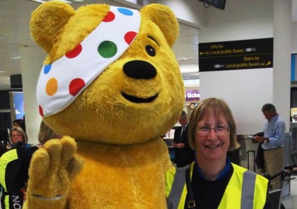 Past president Alison Boram with Pudsey Bear